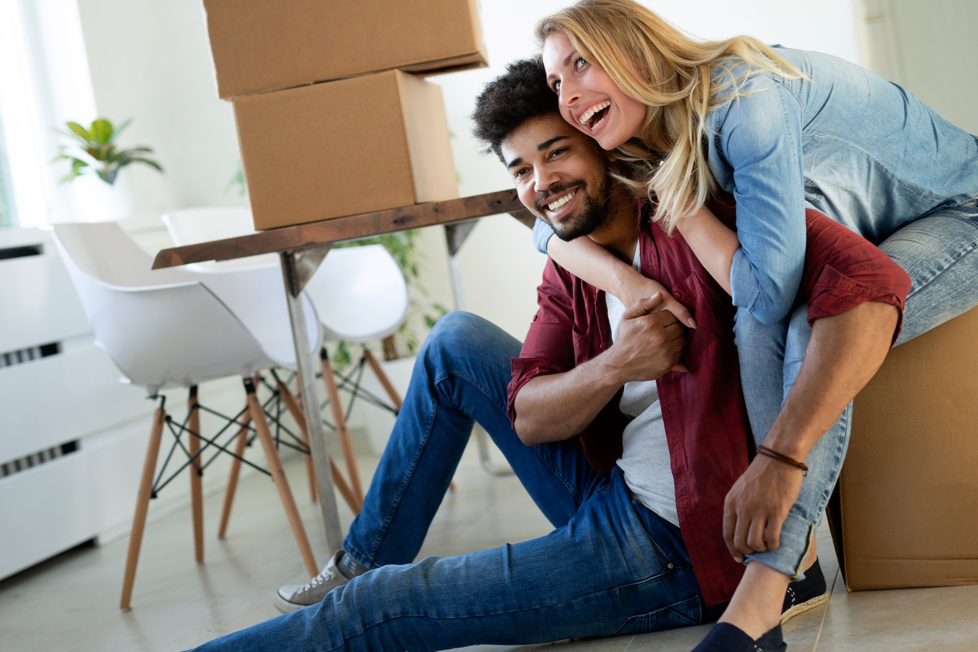 Happy couple after moving in to new home