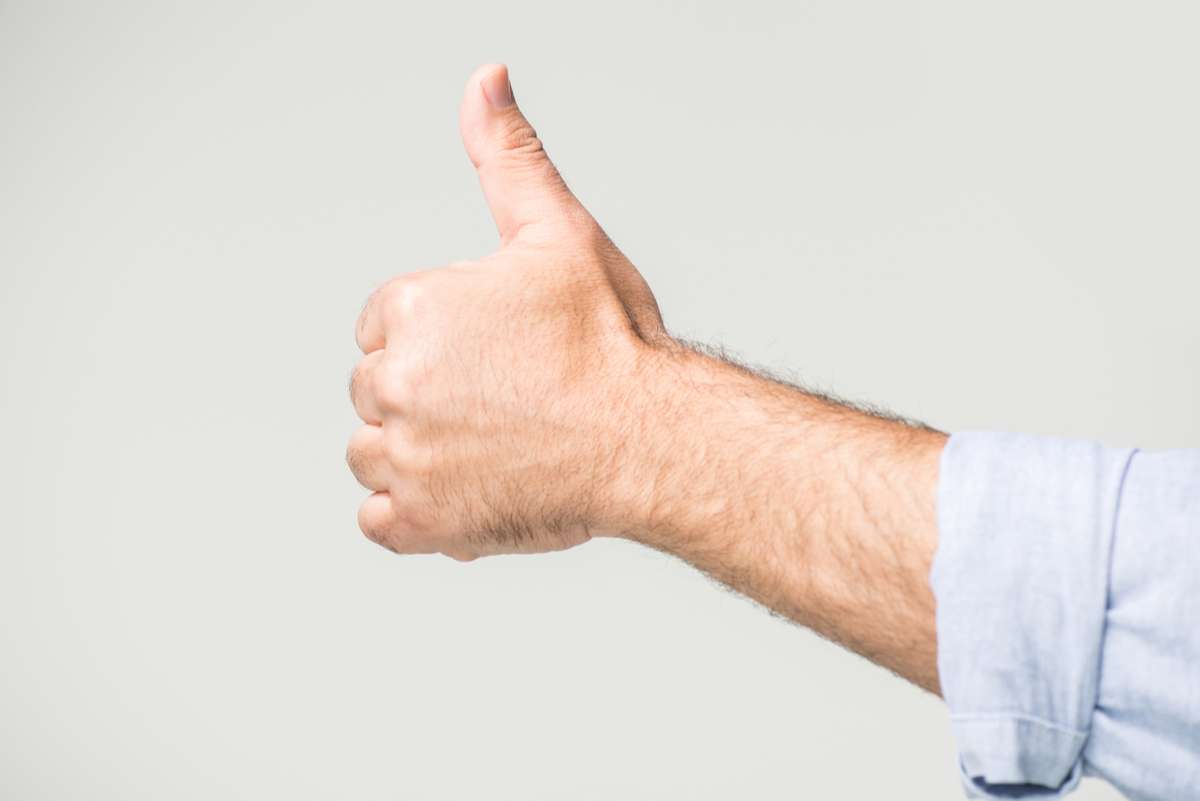 Man showing thumb up